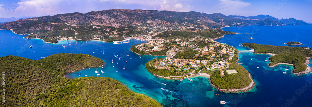 Sivota - stunning aerial drone video of turquoise sea known as Blue Lagoon and unique beach Bella Vraka. Epirus, Greece