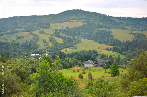 Landscape of summer village in the Carpathian mountains. Travelling to the mountains , trip to the Carpathian mountains concept 