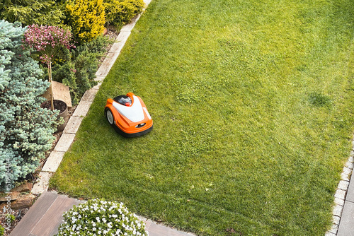 robotic lawn mower, automatic lawn mower, grass lawn mower photo