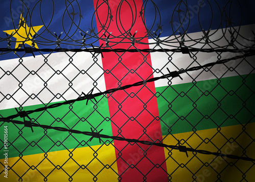 Central African Republic flag behind barbed wire and metal fence