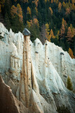 Picturesque view on natural earth pyramids in autumn season. Renon, Ritten, Dolomites, South Tyrol, Italy