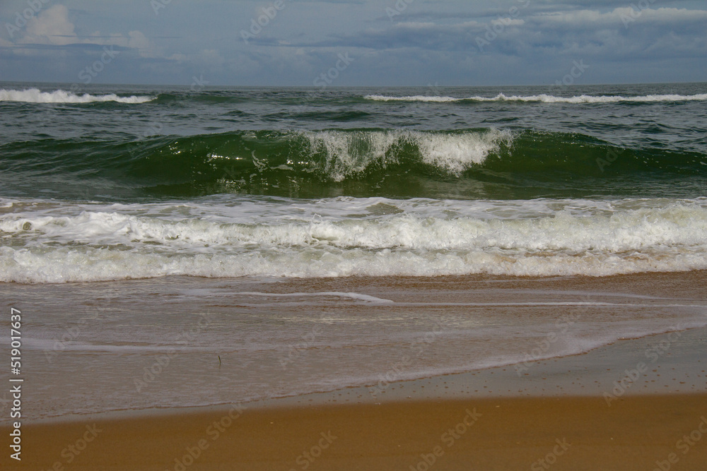 Close-up of a wave crashing into the beach in the Outer Banks