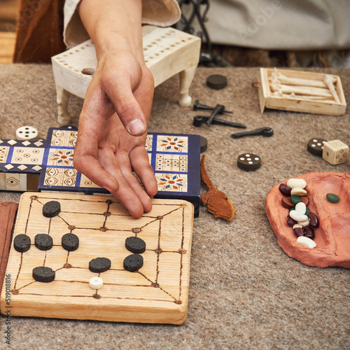 Mill, Kalah and Royal Ur game, popular in ancient Roman. Reconstruction of board games from the Roman Empire photo