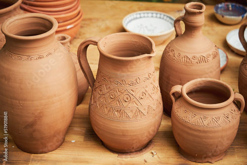 Handmade vintage ceramic tableware according to medieval technologies. Reconstruction of the events of the Middle Ages in Europe.