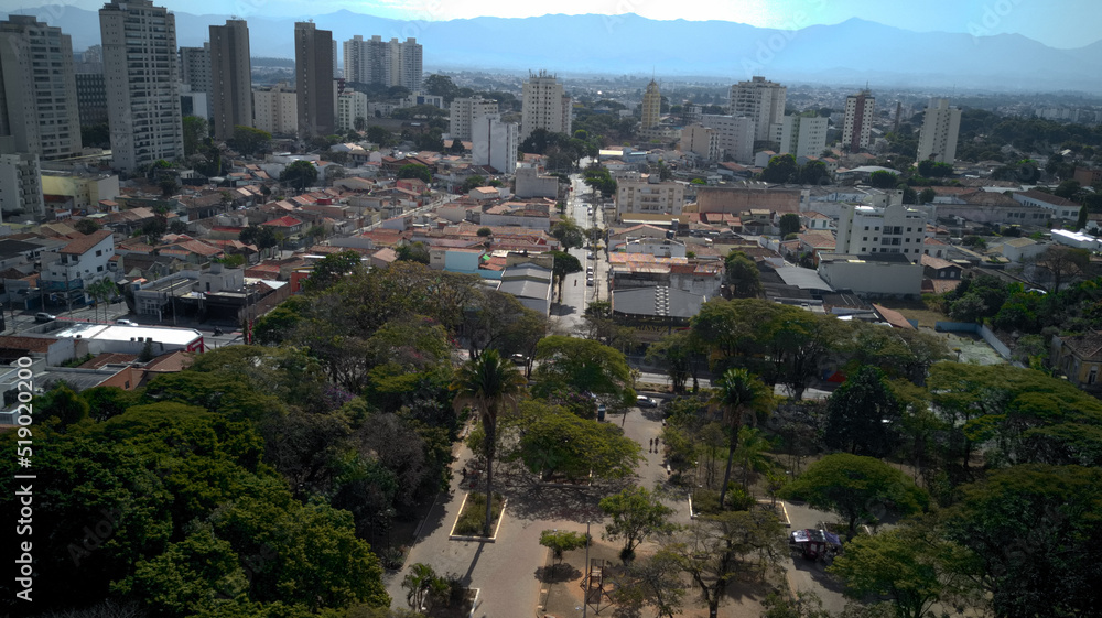 Aerial view of Taubate from Santa Terezinha square, with the mantiqueira mountain range in the background, on a sunny afternoon in winter