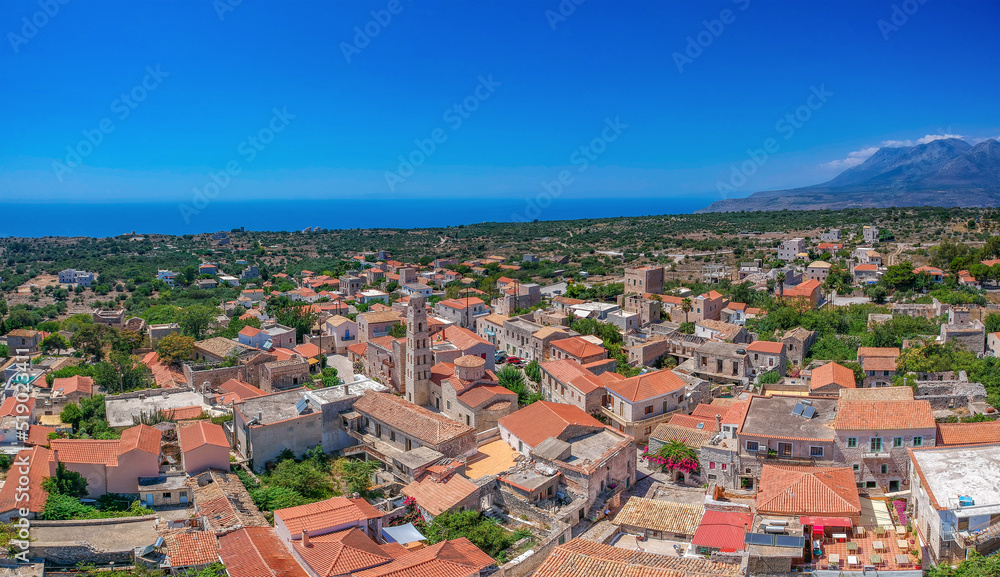 Aerial view of the beautiful seaside town Areopoli with traditional architectural buildings and stoned houses in Laconia, Greece