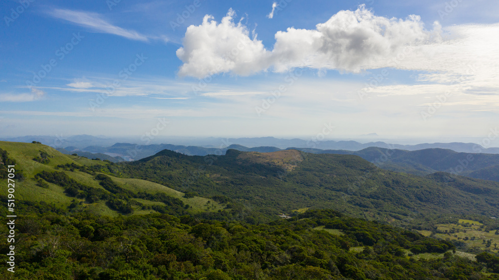 Green rainforest and jungle in the mountains of Sri Lanka view from above. Riverston, Sri Lanka. Green rainforest and jungle in the mountains of Sri Lanka view from above. Riverston, Sri Lanka.