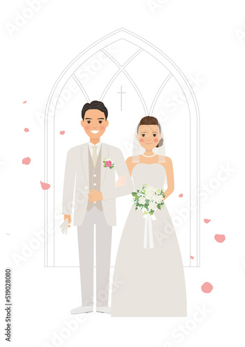結婚式で腕を組む新郎新婦