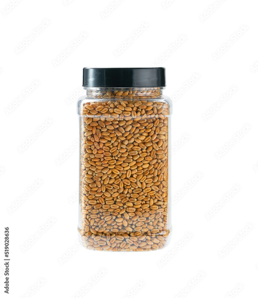 plastic jar with uncooked wheat grains isolated on white background. plastic jar with uncooked wheat grains isolated on white background.