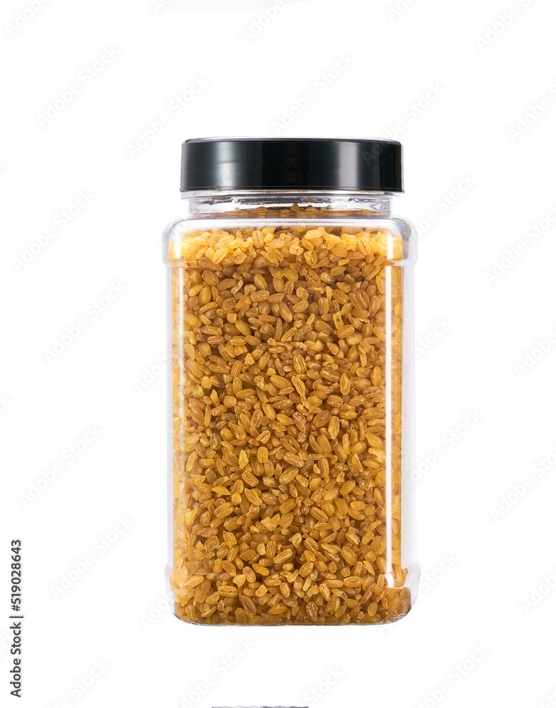 plastic jar with uncooked bulgur isolated on white background. plastic jar with uncooked bulgur isolated on white background.