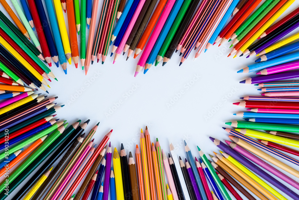 Various colorful crayons designed on white surface with copy space Various colorful crayons designed on white surface with copy space