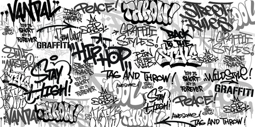 Fototapeta Graffiti background with throw-up and tagging hand-drawn style. Street art graffiti urban theme for prints, banners, and textiles in vector format.