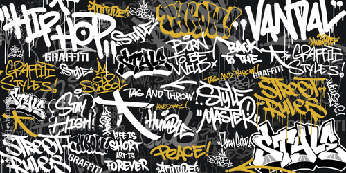 Graffiti background with throw-up and tagging hand-drawn style. Street art graffiti urban theme for prints, banners, and textiles in vector format. photo