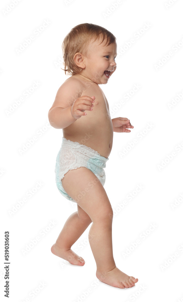 Cute baby in diaper learning to walk on white background Cute baby in diaper learning to walk on white background