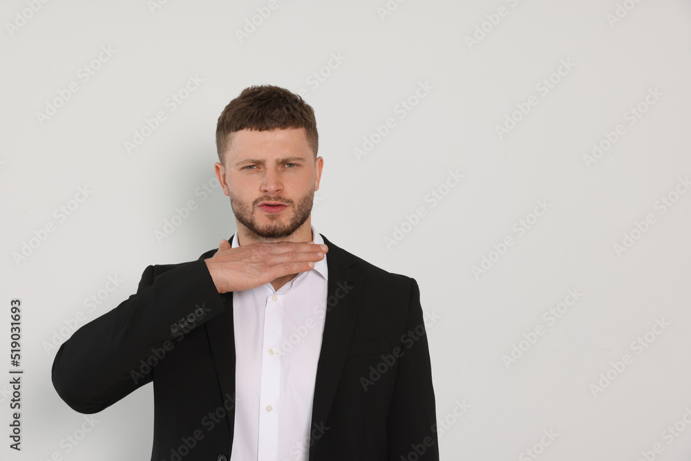 Aggressive young man on white background, space for text Aggressive young man on white background, space for text