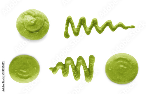 Set with spicy wasabi paste on white background, top view photo