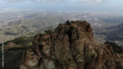 Drone Aerial View Roque Saucillo and a man .  Grand Canary Island,  Spain. Vega de San Mateo, Islas Canarias. photo