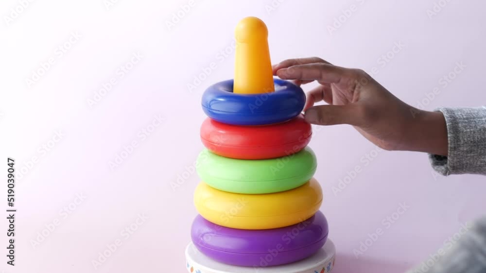 Baby toys on color background. Child development concept. Baby toys on color background. Child development concept.