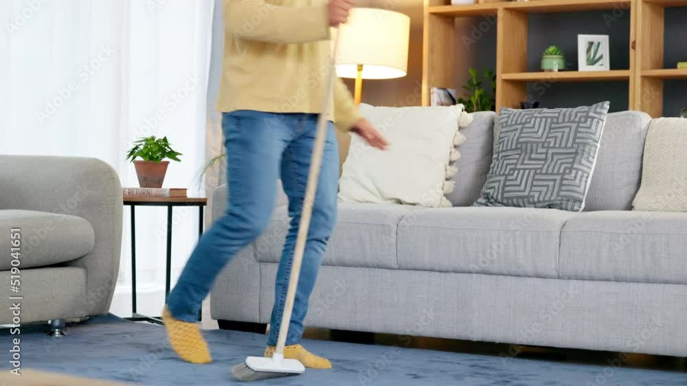 Making cleaning and chores fun, dancing around while sweeping his