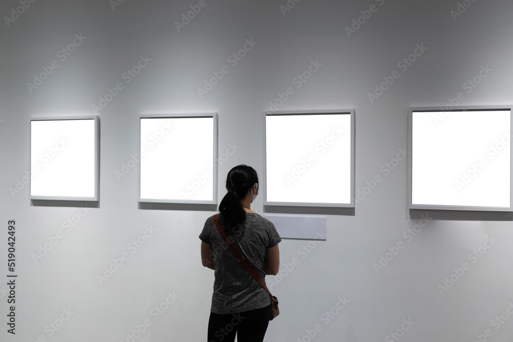 interior of gallery with blank frame interior of gallery with blank frame