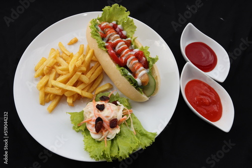 AMERICAN HOTDOG WITH FRENCH FRICE POTATO photo