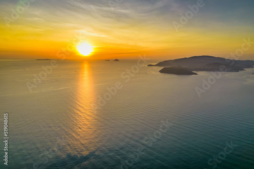 Aerial view of sunrise offshore as the sun rises to welcome a new day in the central coast of Vietnam © huythoai