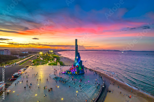 Sunset at Nghinh Phong cape, Phu Yen, Vietnam, with square, beach, park, beautiful sunset sky. Nghinh Phong Is A New Symbol Of Phu Yen photo