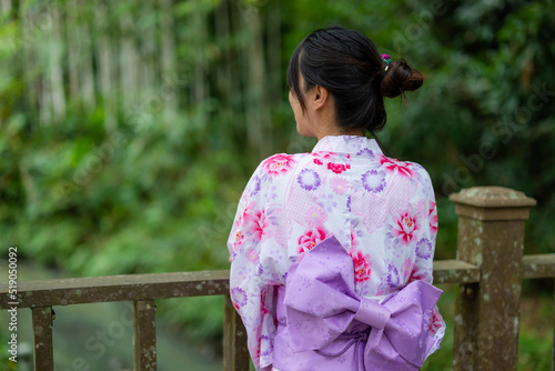 Japanese woman wear yukata at outdoor park