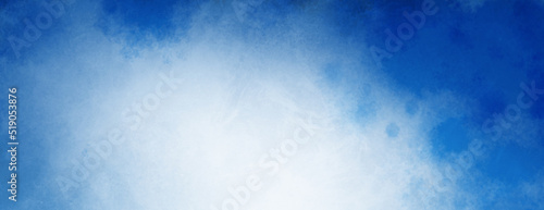 Blue watercolor background with white cloudy center and abstract watercolor sky border design with stormy painted texture