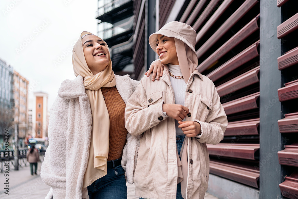 Fototapeta premium Cheerful Muslim Friends