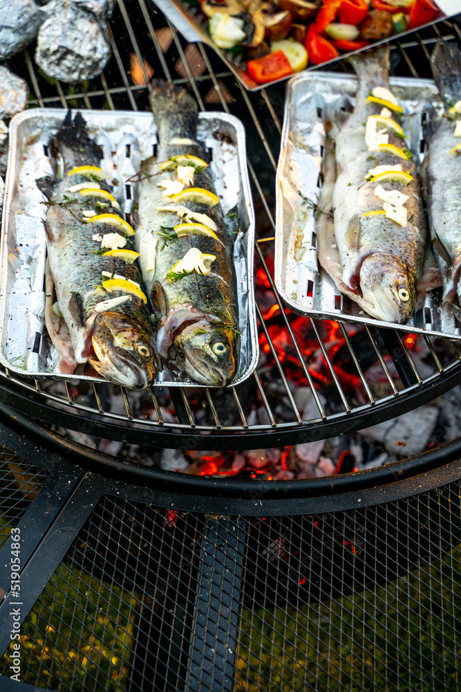 Vegetables and fishes on the grill