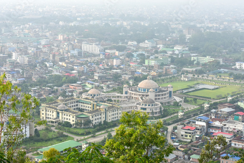 An aerial view of Manipur Assembly hall from Imphal view tower present at top of the Cheirao Ching hill.