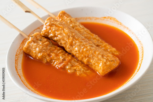 Omuk - Korean fish cake skewer in Korean spicy soup photo