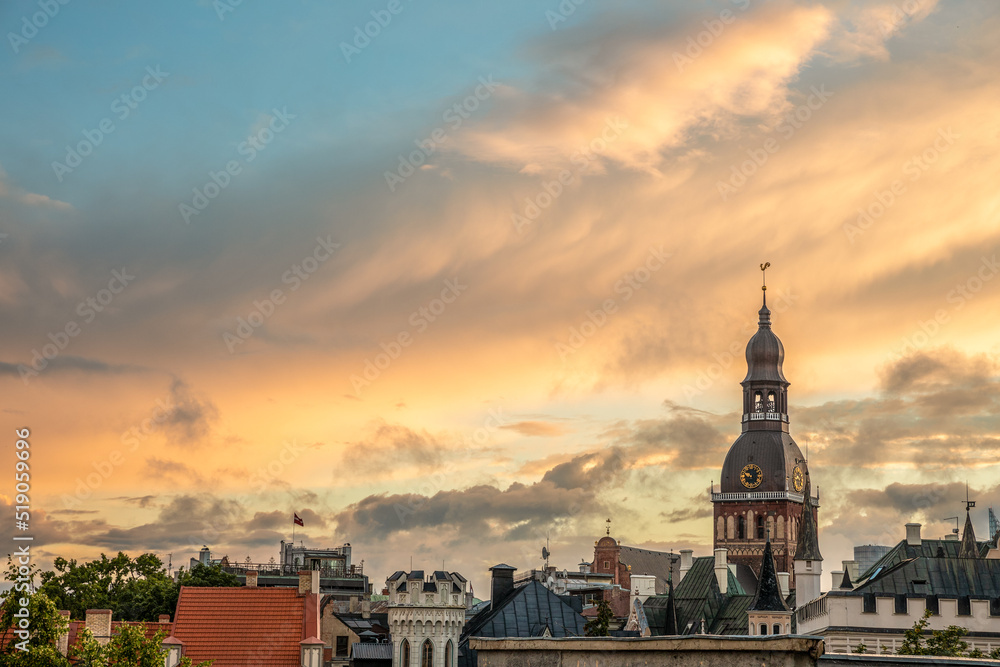 Beautiful top view of the rooftops of the Old Town of Riga at sunset