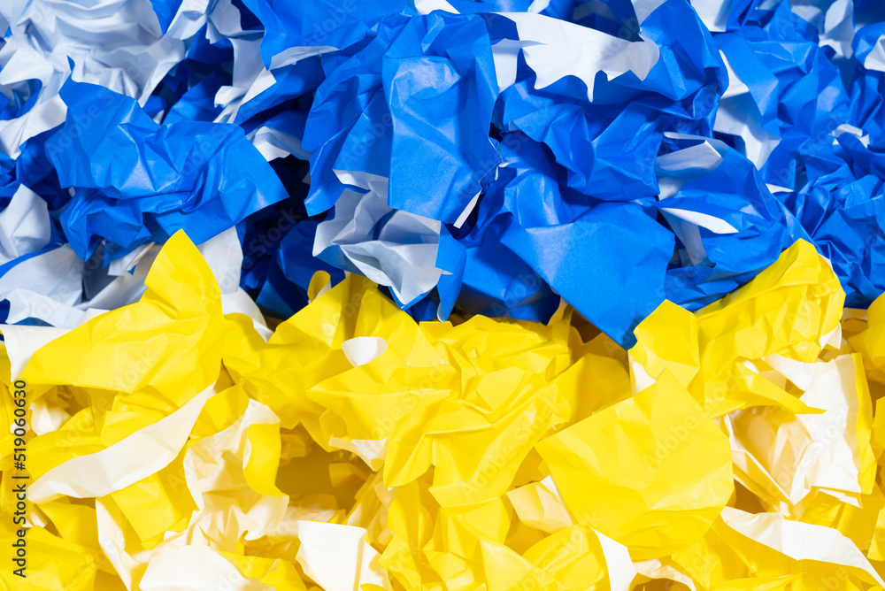 crumpled paper of yellow and blue, colors of the national flag of Ukraine crumpled paper of yellow and blue, colors of the national flag of Ukraine