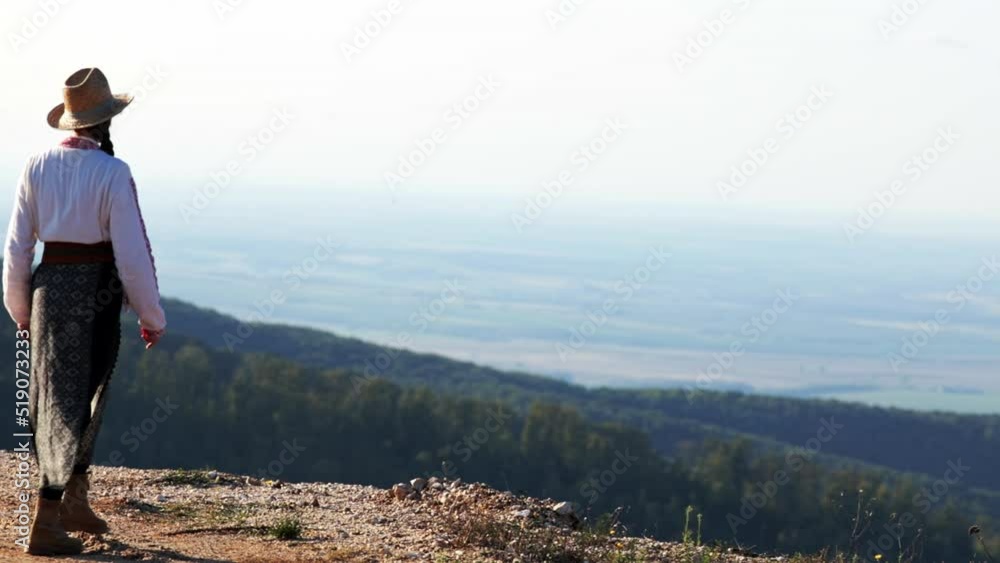 Romanian girl walks over the hills and admires the view 2 Romanian girl walks over the hills and admires the view 2