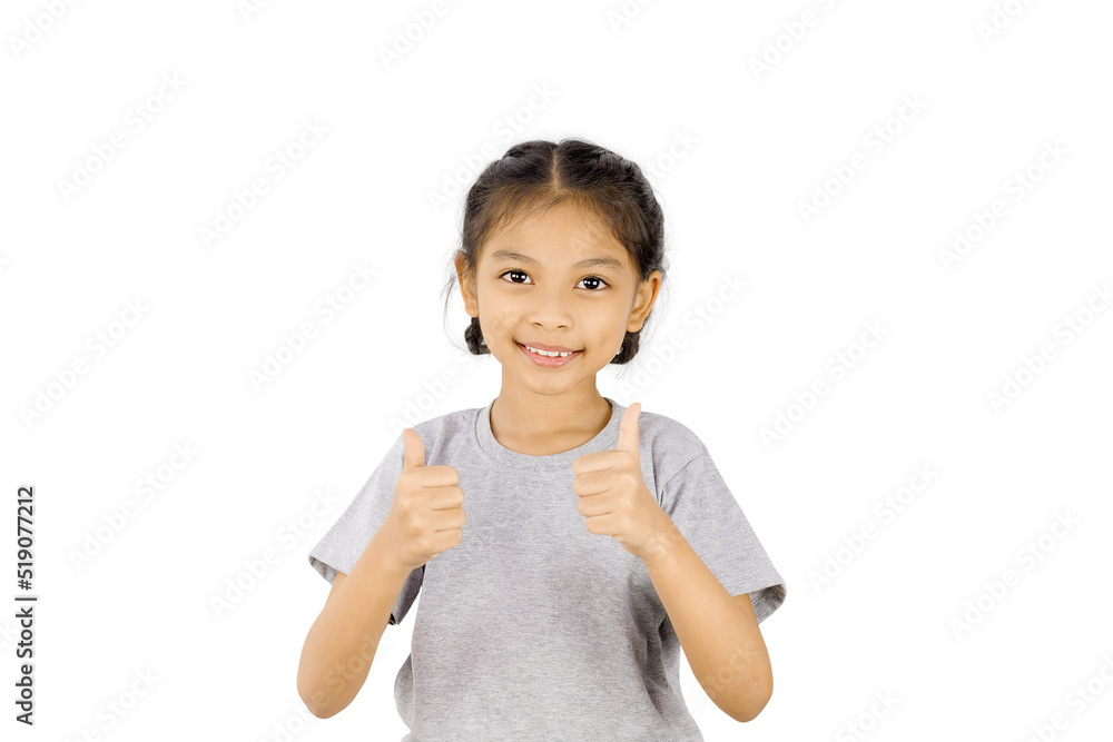 a child girl standing and smiling with thumbs up isolated on white background. a child girl standing and smiling with thumbs up isolated on white background.