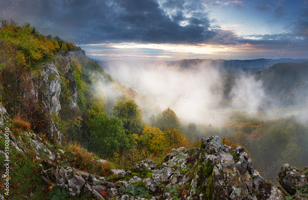 Fototapeta premium Beautiful autumn morning on the view point above the deep forest valley in Carpathian, Slovakia