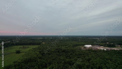 Drone view of forest with road sunset aerial dramatic sky photo