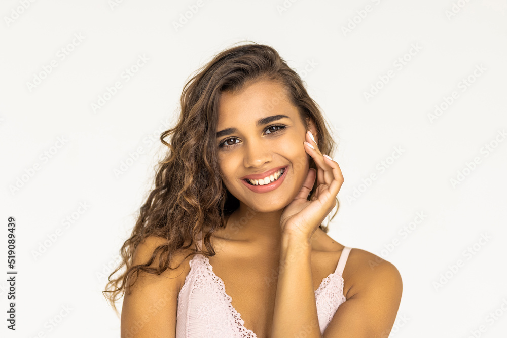 Portrait of a beautiful curly female model on white background Portrait of a beautiful curly female model on white background