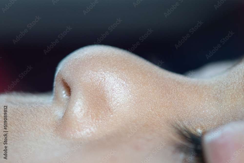 Naklejka premium Children's nose. macro 