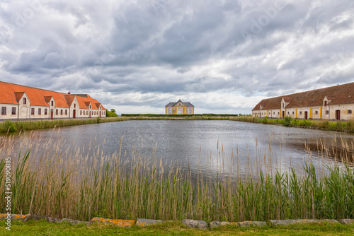 Pond, pavilion and farm buildings at Valdemar's Slot, Svendborg, Denmark