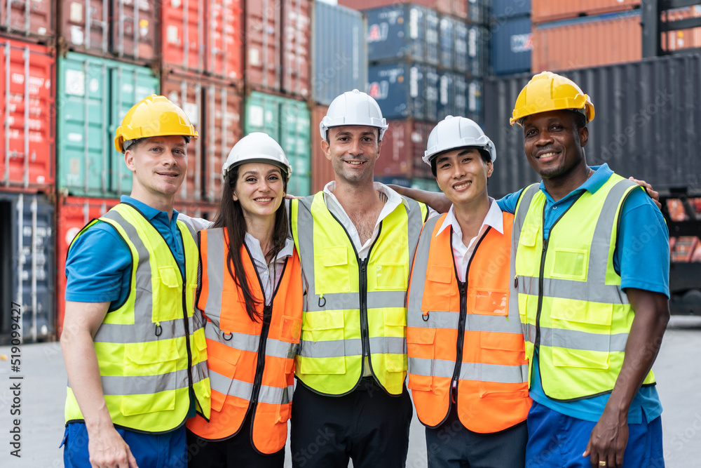 Portrait group of male and female worker working in container terminal Portrait group of male and female worker working in container terminal
