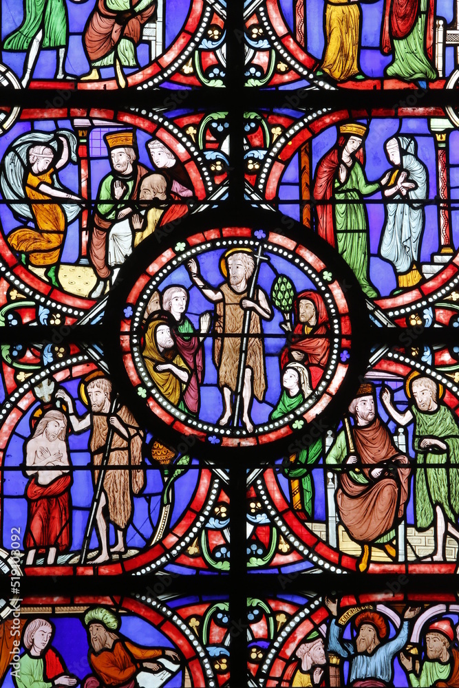 Stained glass in Notre Dame de Coutances cathedral depicting scenes from Saint John the Baptist's life