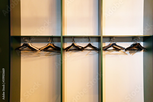 Fototapeta Dressing room. an empty closet with hangers for storing clothes.