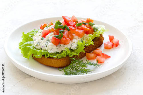 sandwich with tomatoes, green onions, ricotta cheese and fresh lettuce