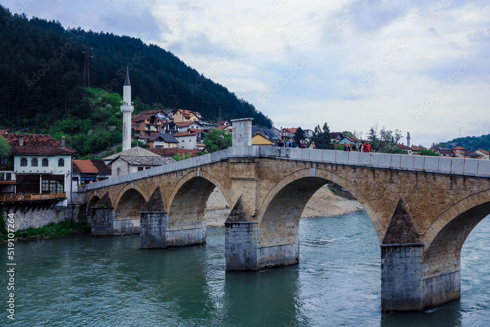 View in the Rainy Day to the historic Mehmed Paša Sokolović Bridge Bridge in Višegrad, over the Drina River, Bosnia and Herzegovina