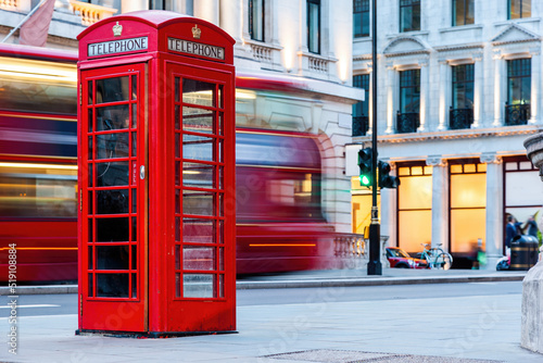Photography London red telephone booth and red bus in motion
