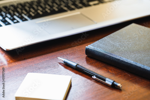 Wallpaper Mural Work desk with a laptop, pencil, diary and note pad Torontodigital.ca