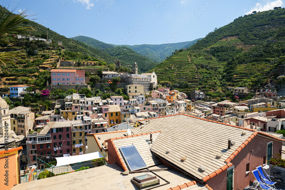 Travel to Cinque Terre. Aerial view over Vernazza architecture landmark village at the coast of Liguria Sea from Italy. 